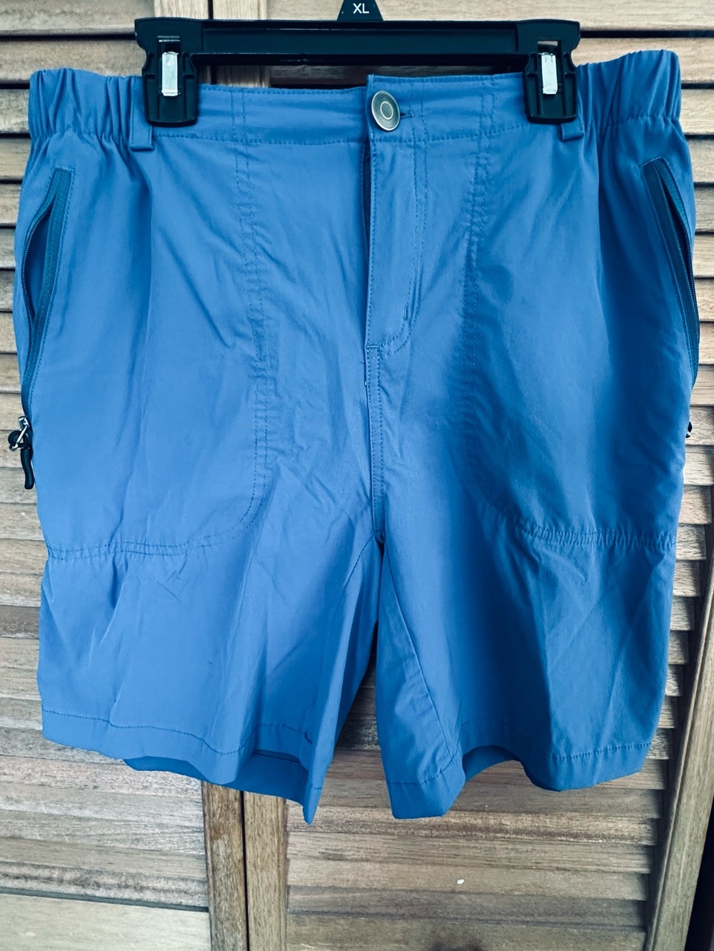 Pudolla women’s blue quick dry shorts. 7 inch inseam.  Like new